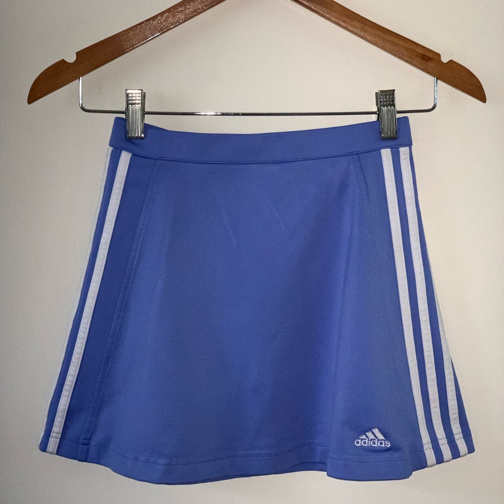 Adidas blue tennis skirt. Activewear. Size 4. Adidas stripes. Flattering fit.